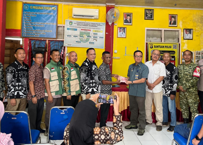 Pemdes Sinar Rambang Salurkan BLT Dana Desa dan Insentif Kader, Warga Terima Rp900 Ribu