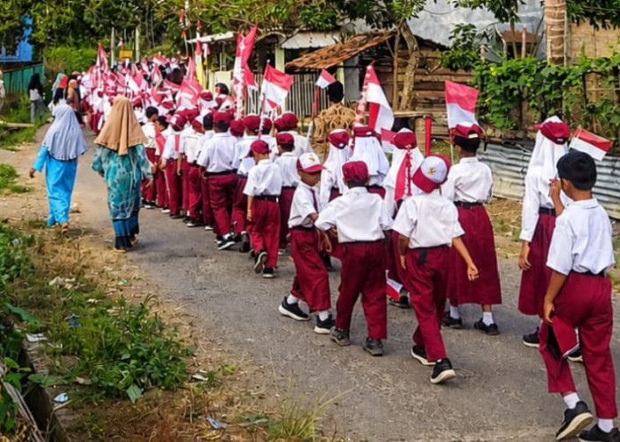 Semarak HUT RI ke-81, Desa Jiwa Baru Gelar Pawai Bendera Diikuti Siswa TK hingga SMP