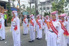 Kenakan Topi Pink, SD Negeri 38 Prabumulih Tampil Cantik di Gerak Jalan HUT RI ke-81